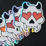 Holographic Heart Eyed Devil Skull Sticker